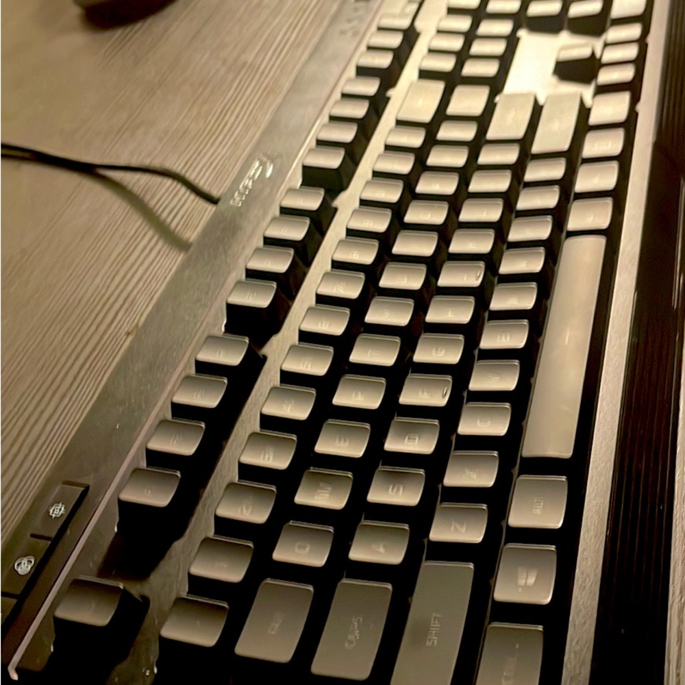 This is a gaming keyboard by Hyperx. It has rgb lighting and mechanical keys.